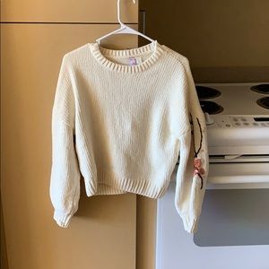 sweater with embroidered flowers